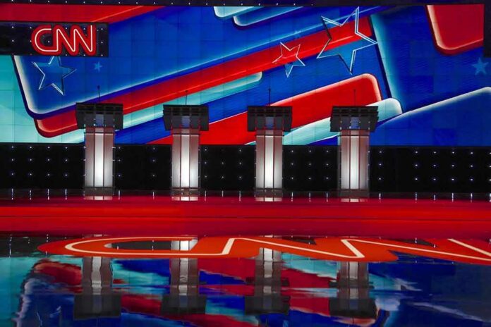 shutterstock_353120129 Debate stage with four podiums and colorful star backdrop