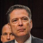 James Comey at a hearing, close-up portrait